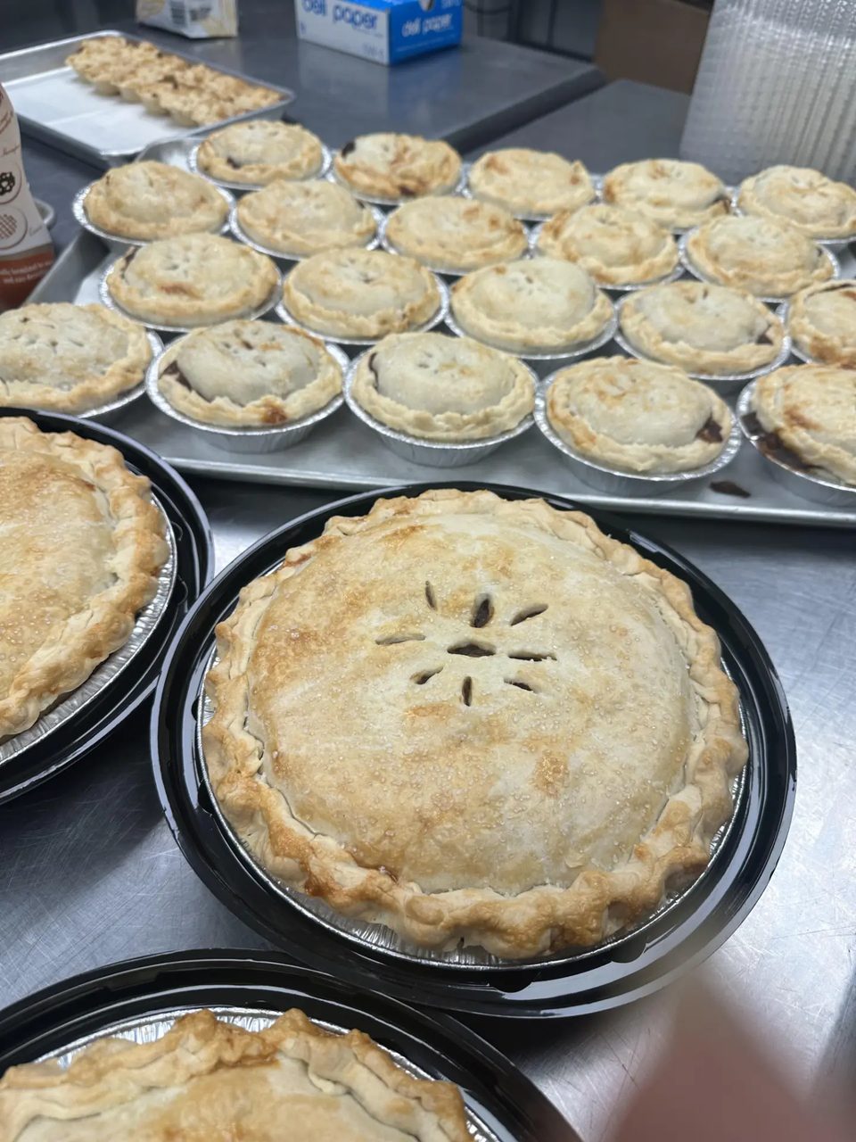 Freshly baked whole and personal pies in Anita’s Pie Shop kitchen.